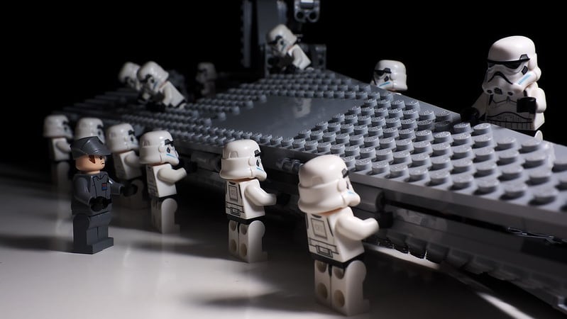 Lego stormtroopers building a starship